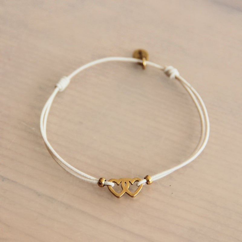 Laudeen - Elastic bracelet with double hearts - sand/gold - BAZOU